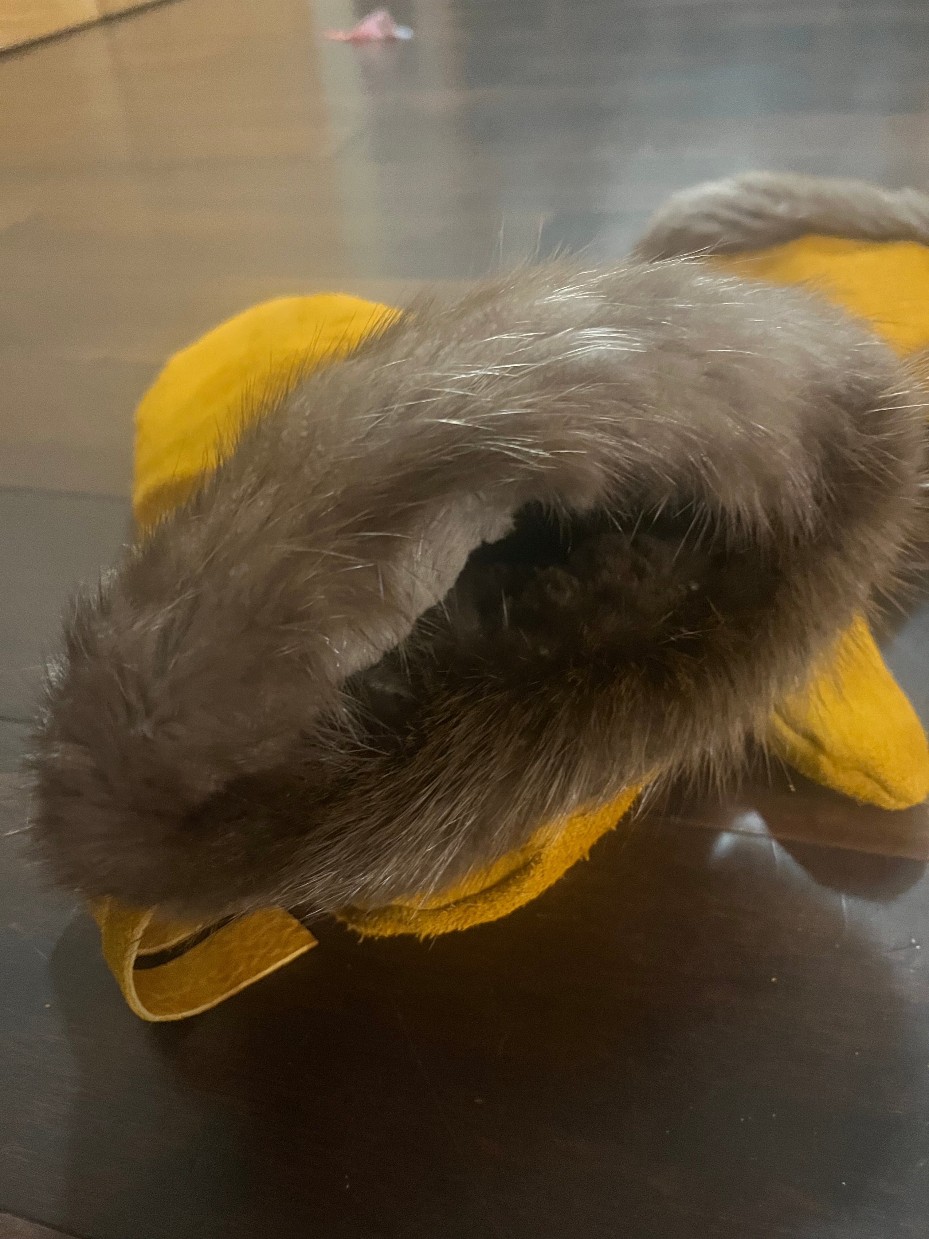 Leather mittens, fringe, fur trim and sheared sheep liner