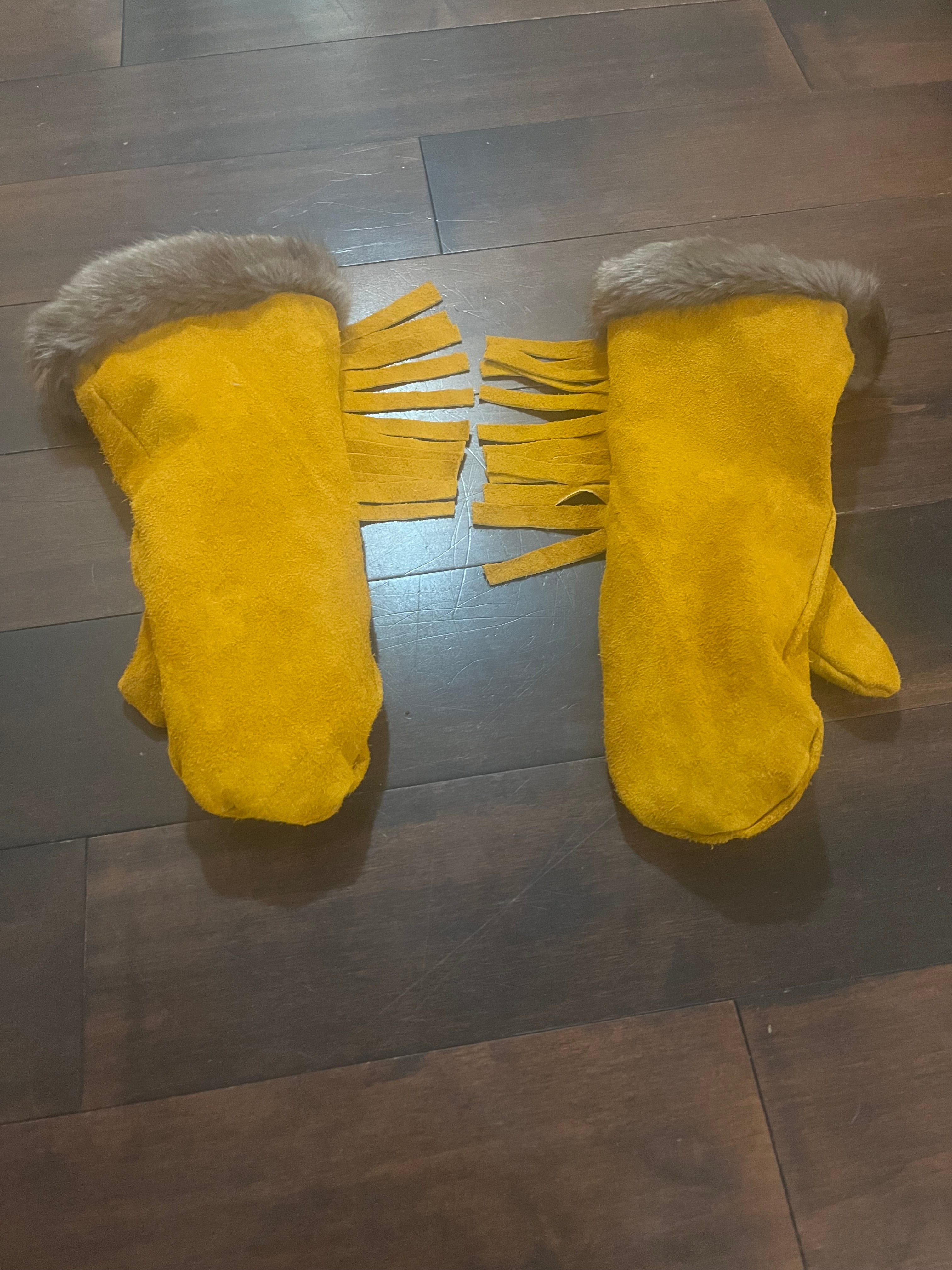 Leather mittens, fringe, fur trim and sheared sheep liner